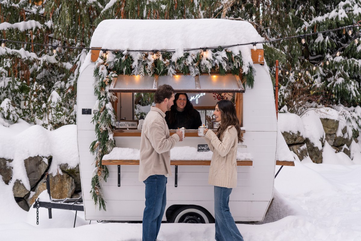 Four Seasons Whistler - Vintage Camper serving hot chocolate